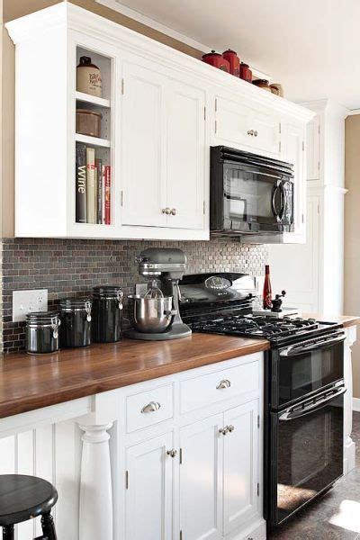 Cabinets can be refinished to a medium coffee brown. Black Appliances and White or Gray Cabinets - How to Make ...