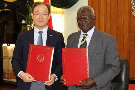 Pm And Chinese Envoy Sign Agreement On Economic And Technical