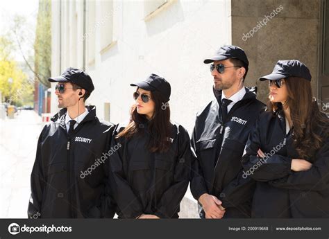 Portrait Young Male Female Security Guards Wearing Uniform Eyeglasses