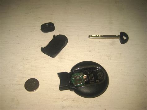 The key locks/unlocks the doors. Mini-Cooper-Key-Fob-Battery-Replacement-Guide-017