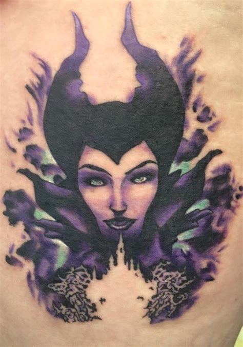 Maleficent With An Outline Of Cinderellas Castle 41 Disney Tattoos