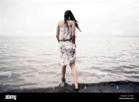 Woman In Dress Wading In Water Hi Res Stock Photography And Images Alamy