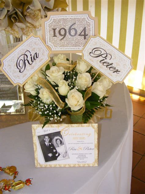 Party Centerpiece Flowers And Invitation For 50th Anniversary 50th