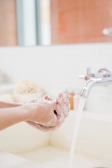 Close Up Of Woman Washing Hands In Bathroom — Soap Care Stock Photo