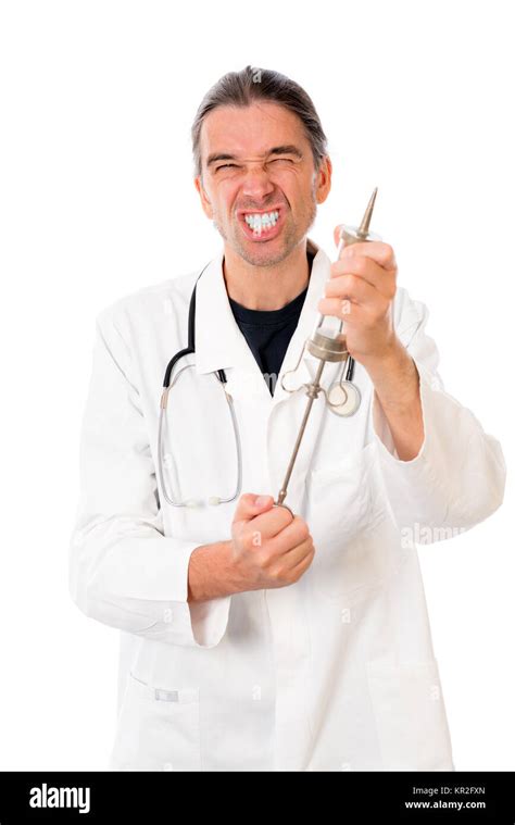 Funny Doctor With A Big Injection In White Lab Coat Stock Photo Alamy