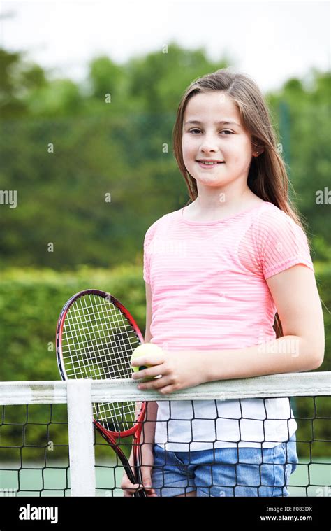 Portrait Of Young Girl Playing Tennis Stock Photo Alamy