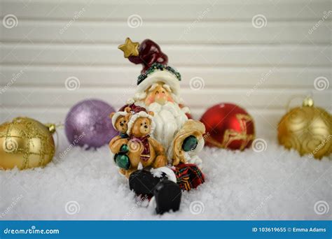 Imagem Da Fotografia Do Natal Do Ornamento De Santa Claus Que Senta Se