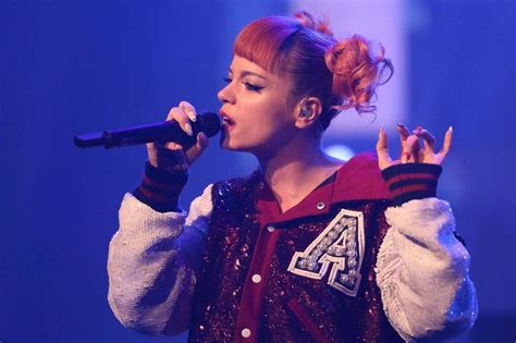 Lily Allen Gets Playful In Pigtails And A Crop Top As She Performs In