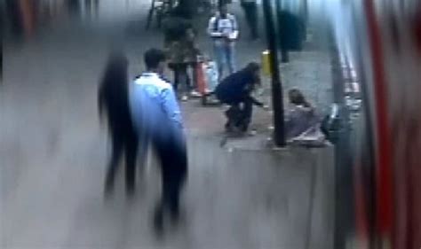 Uk Crime Shocking Moment A Woman Is Pushed Into The Path Of An