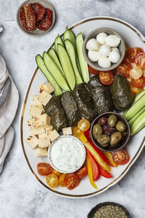 Middle Eastern Meze Platter With Vegetables Crowd And Tzatziki Sauce