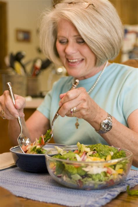 Salad Free Stock Photo A Woman Eating A Fresh Salad 17233