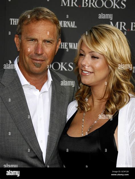Kevin Costner And Wife Christine Baumgartner Attend Los Angeles Stock
