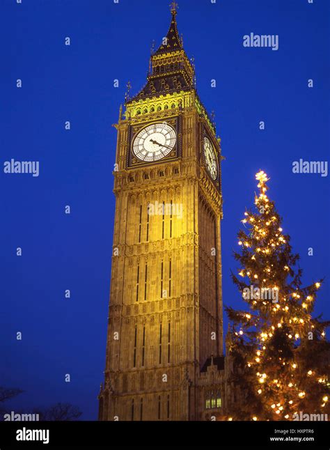 Big Ben Clock Tower At Dusk And Christmas Tree City Of Westminster
