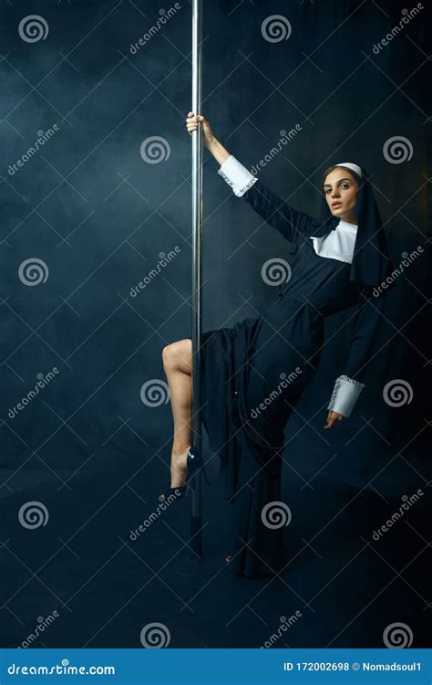 Nun In Cassock Dances On Pole Like A Stripper Stock Photo Image Of Attractive Monastery