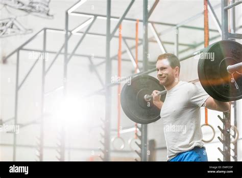 Man Lifting Weights At Gym Hi Res Stock Photography And Images Alamy