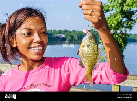 Black Asian Teen Girl Catch Caught Fish Fishing Hi Res Stock