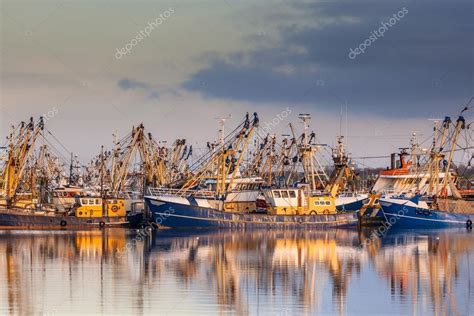 Dutch Fishing Fleet During Majestic Sunset Stock Photo By
