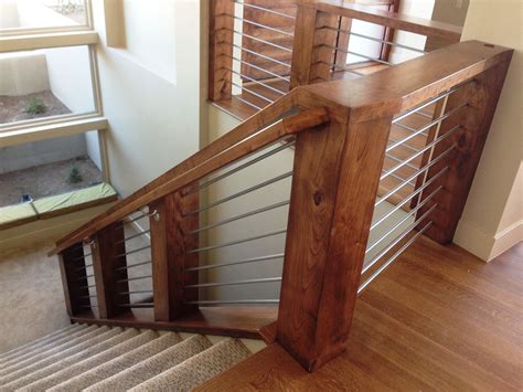 Cherry Wood Contemporary Staircase With Round Metal Horizontal