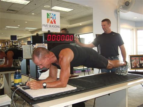 guinness world record holder george hood performs 2 hour training plank at five seasons burr