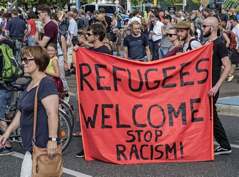 Germans Stage Pro Migrant Rally With Refugees Welcome Banners In Response To Violence The