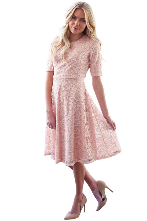 Your timeless bridesmaid dress awaits. Sloan Modest Bridesmaid Lace Dress in Blush Pink