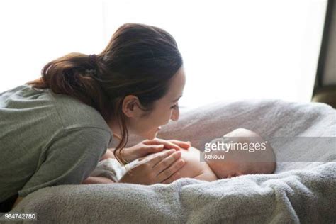 Son Massaging Mom Photos And Premium High Res Pictures Getty Images