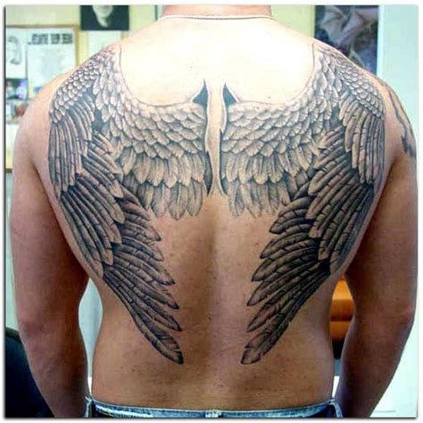 The Back Of A Man With Wings On His Back