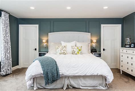 Dark blue grass cloth walls and drapery in an abstract watery blue and ivory pattern lend softness to the space. Family Home with Stylish Transitional Interiors - Home ...