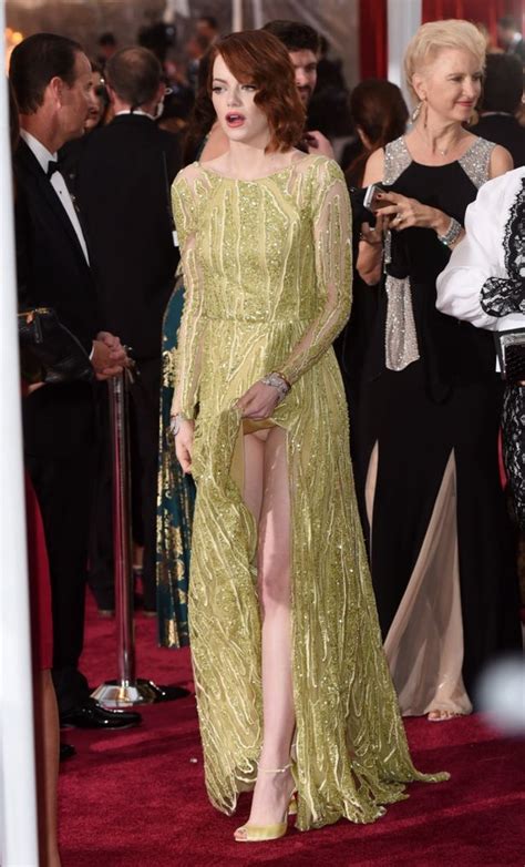Oscars 2015 Red Carpet Looks Emma Stone Flashes Her Nude Underwear By