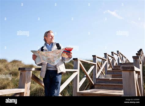 Man Holding Map Cala Ratjada Mallorca Balearic Islands Spain Stock Photo Alamy