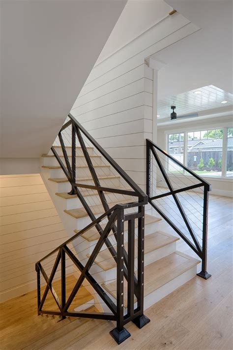 Custom railing fabrication, design and installation for commercial and residential properties around the chicago area in wrought iron and stainless steel. Farmhouse staircase. Metal farmhouse staircase. This ...