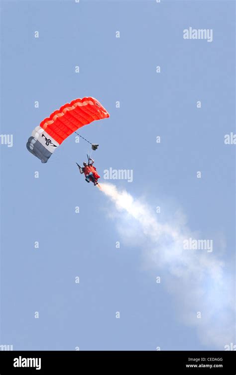 On Liberation Day Parachutists Demonstrate Jumping From Airplane