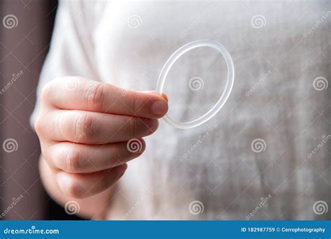 woman`s hand holding a birth control ring vaginal ring for contraceptive stock image image of