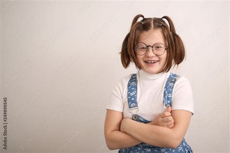 Funny Fat Kid Girl In Glasses With Funny Tails Stock Photo Adobe Stock
