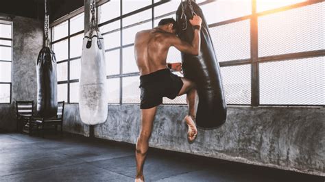 11 Muay Thai Heavy Bag Workouts To Boost Your Performance