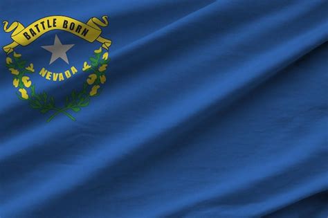 Premium Photo Nevada Us State Flag With Big Folds Waving Close Up