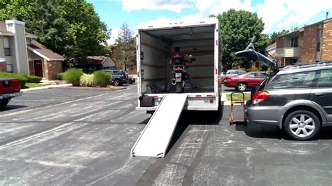 If you're stuck using the bed of a truck, even the truck itself makes a difference. Iago drives a motorcycle into a U-haul - YouTube