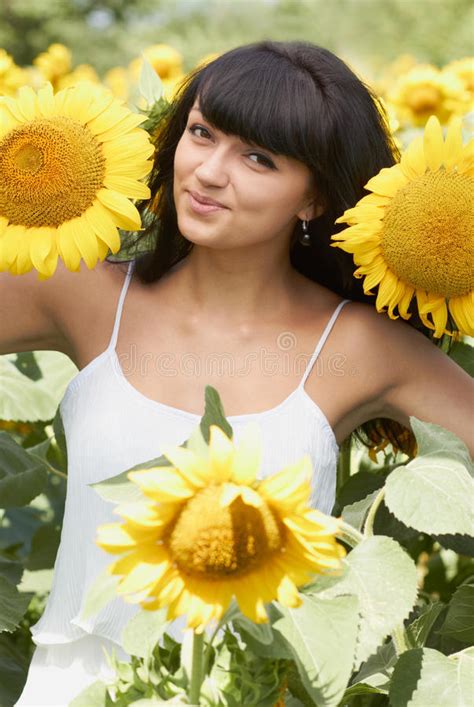 Smiling Woman And Little Girl On Sunflowers Field Stock Photo Image