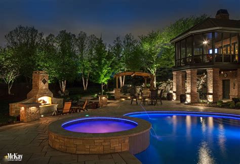 We answer common questions to help you choose fixtures. Explore the landscape lighting design of this outdoor ...