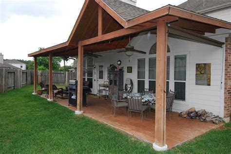 Beautiful Covered Back Porch With Ceiling Fans Is Perfect For
