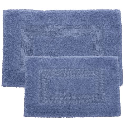 They soak up the drip, drop, and spills after baths and other bathroom activities thus preventing slipping. 2 Piece Reversible Bath Rug Set | Wayfair