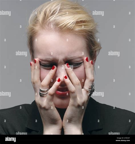 Depressed Female With Hands Over Face Stock Photo Alamy
