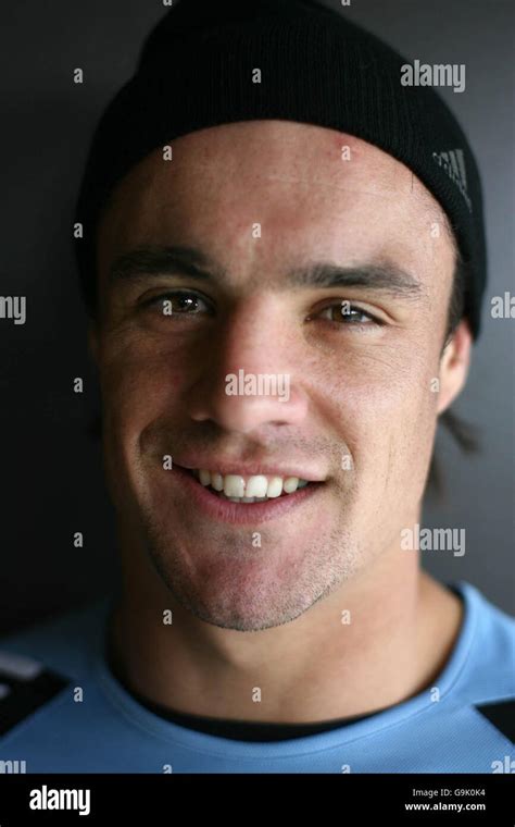 New Zealands Dan Carter Poses For A Photograph Following An Open