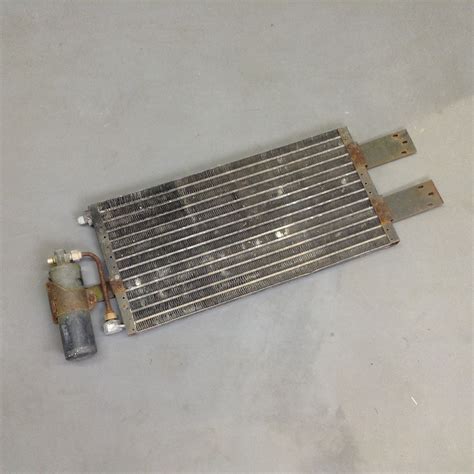 A traditional central air conditioning system has two parts: Scout II Air Conditioner Condenser - Used - IH Scout