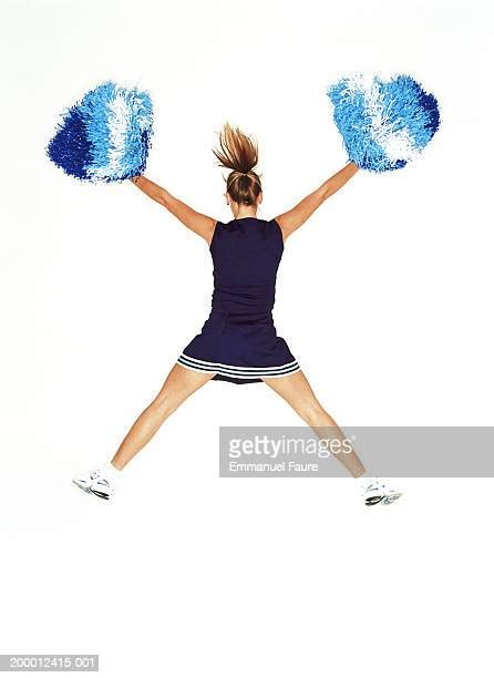 Cheerleaders Jumping Pom Poms Photos Et Images De Collection Getty Images