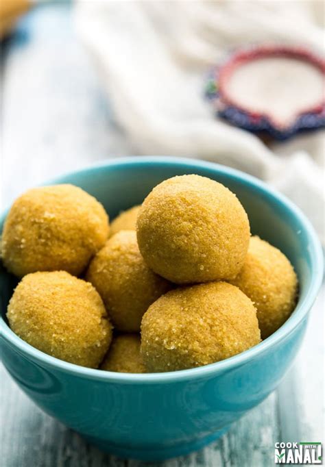 Moving the ladle distorts the shape of the boondi balls. Besan Ladoo - Cook With Manali