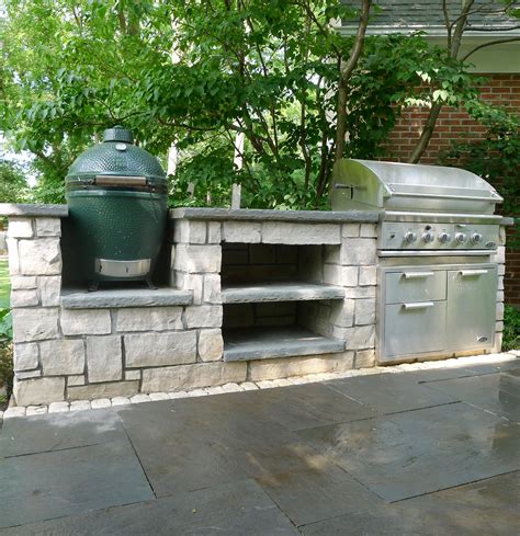When it came time for cabinets and layout, i looked online and at what my buddies had. outdoor grill, green egg, outdoor kitchen, bluestone patio ...
