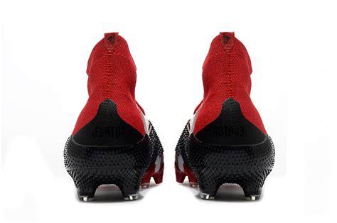 Rubber spines grip the ball for unmatched swerve, and a split outsole helps you dominate. New adidas Predator Mutator 20.1 red, white and black ...