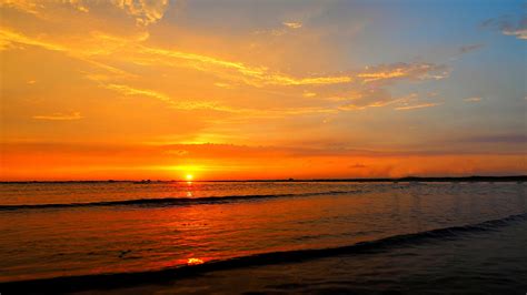 Beautiful Ocean Waves Under Yellow Blue Clouds Sky During Sunset Hd