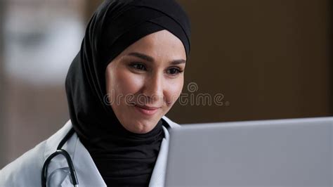 Smiling Arabian Islamic Female Doctor Surgeon Woman Girl In Hijab Give